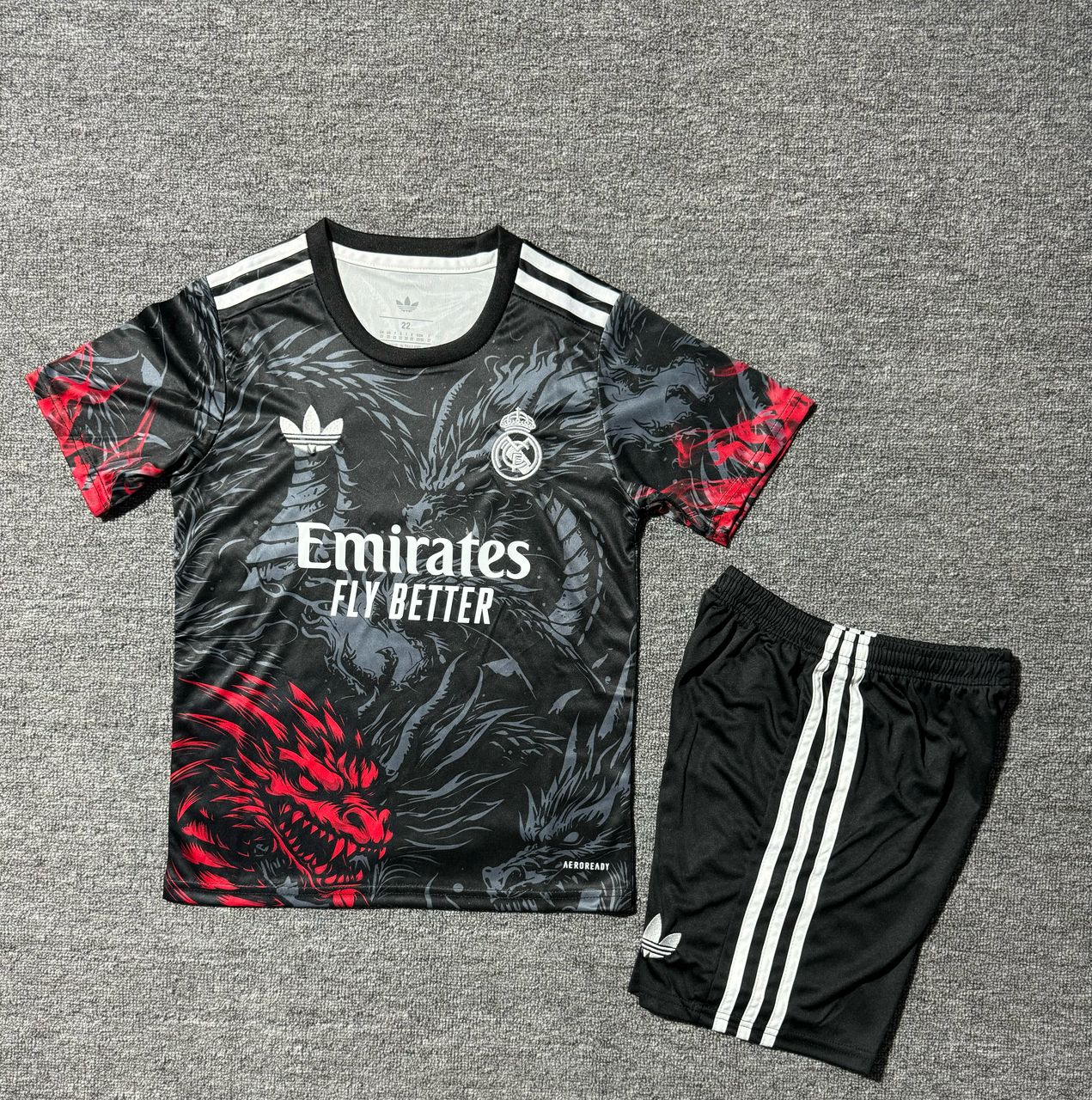 Real Madrid 25/26 Kids dragon black and red Set (T-shirt + shorts)
